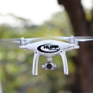 Flying Drone with Huff Insurance Logo