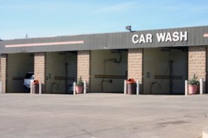 Image of a self serve car wash with 4 bays.  Maryland Car Wash Insurance, Pasadena Car Wash Insurance, Huff Insurance