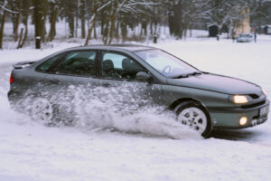 Winter driving safety tips: Car sliding in snow. Huff insurance, Pasadena, Maryland