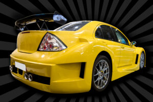 Yellow custom car with custom parts and paint. Custom Car Part Insurance
